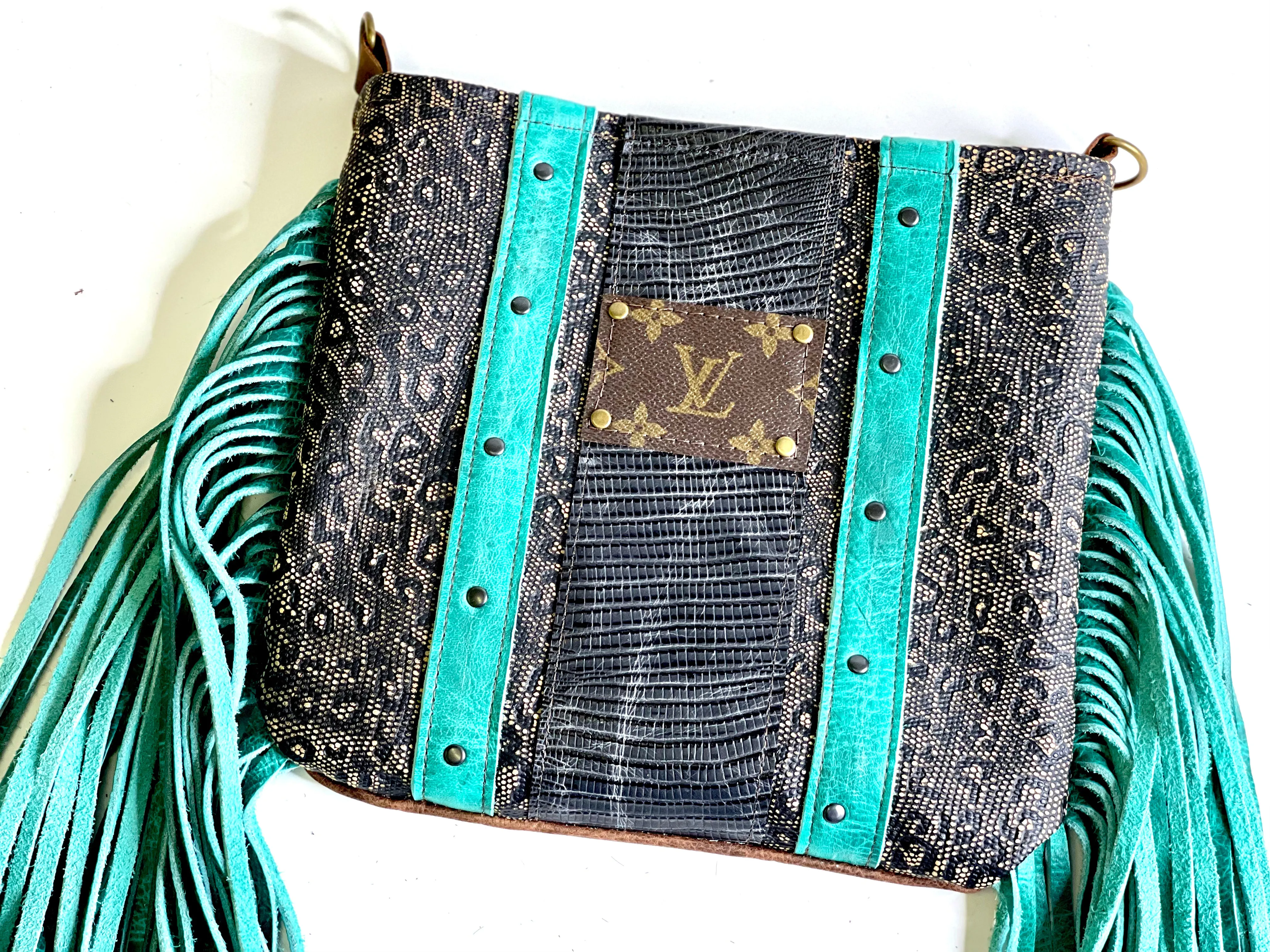 Medium Crossbody  textured leopard with turquoise fringe and black and antique hardware