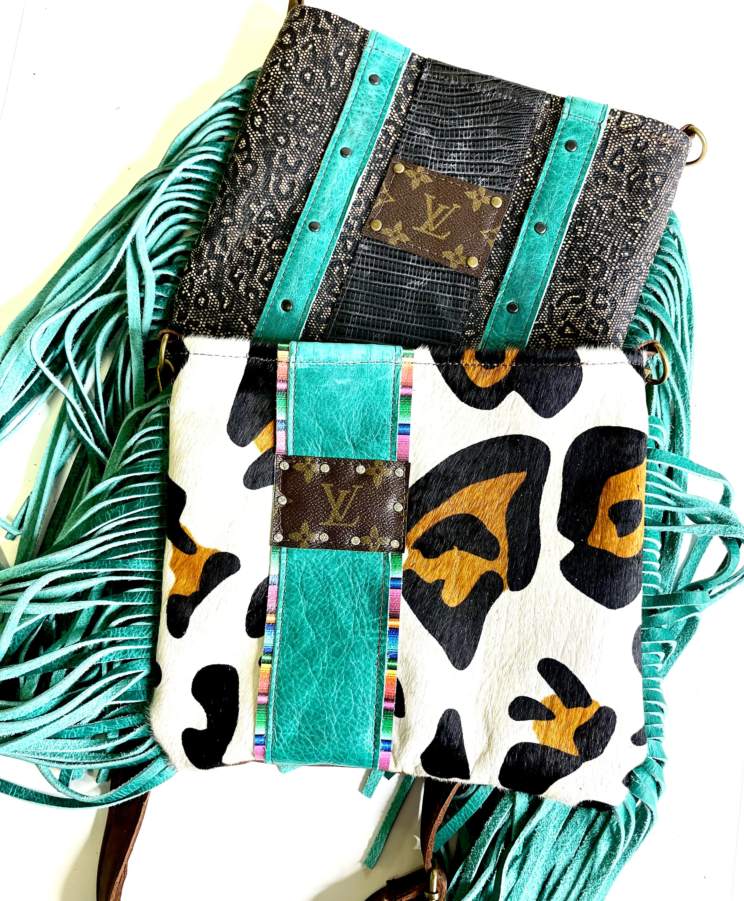 Medium Crossbody  textured leopard with turquoise fringe and black and antique hardware