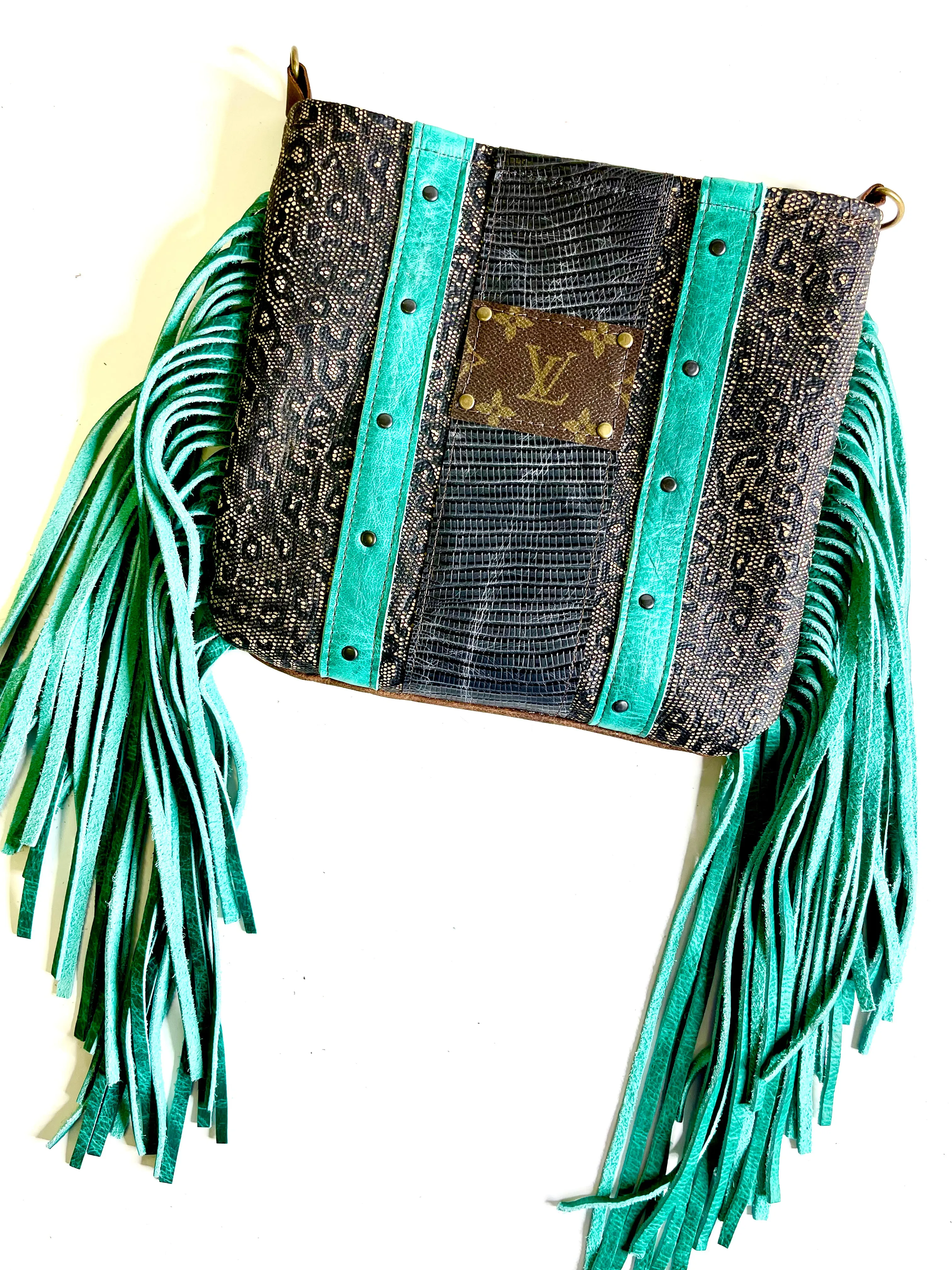 Medium Crossbody  textured leopard with turquoise fringe and black and antique hardware